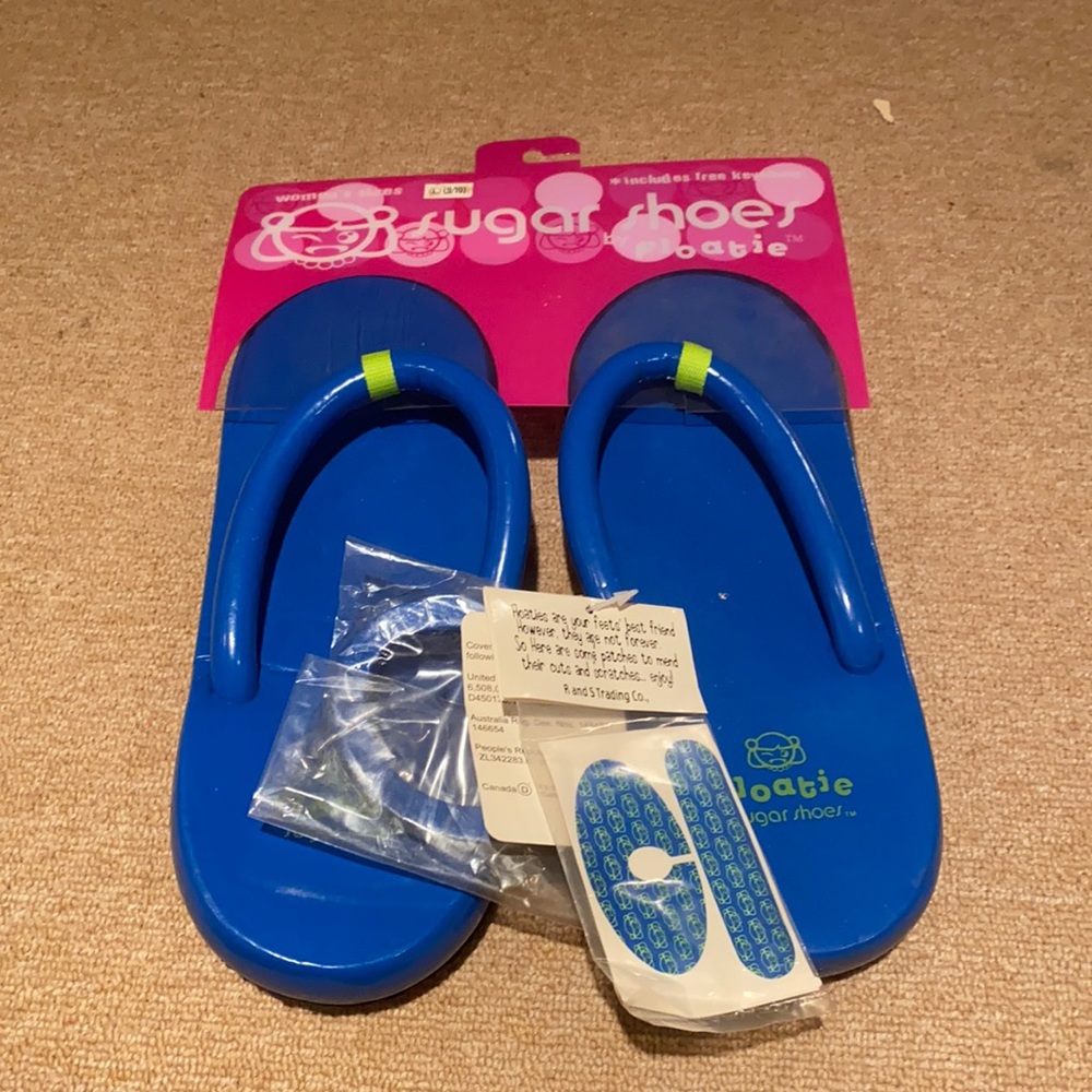 Never worn sugar shoes floatie